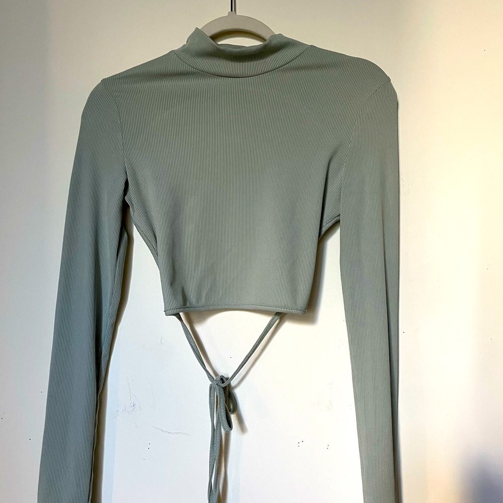 Cute never worn long sleeve sage green top with open back